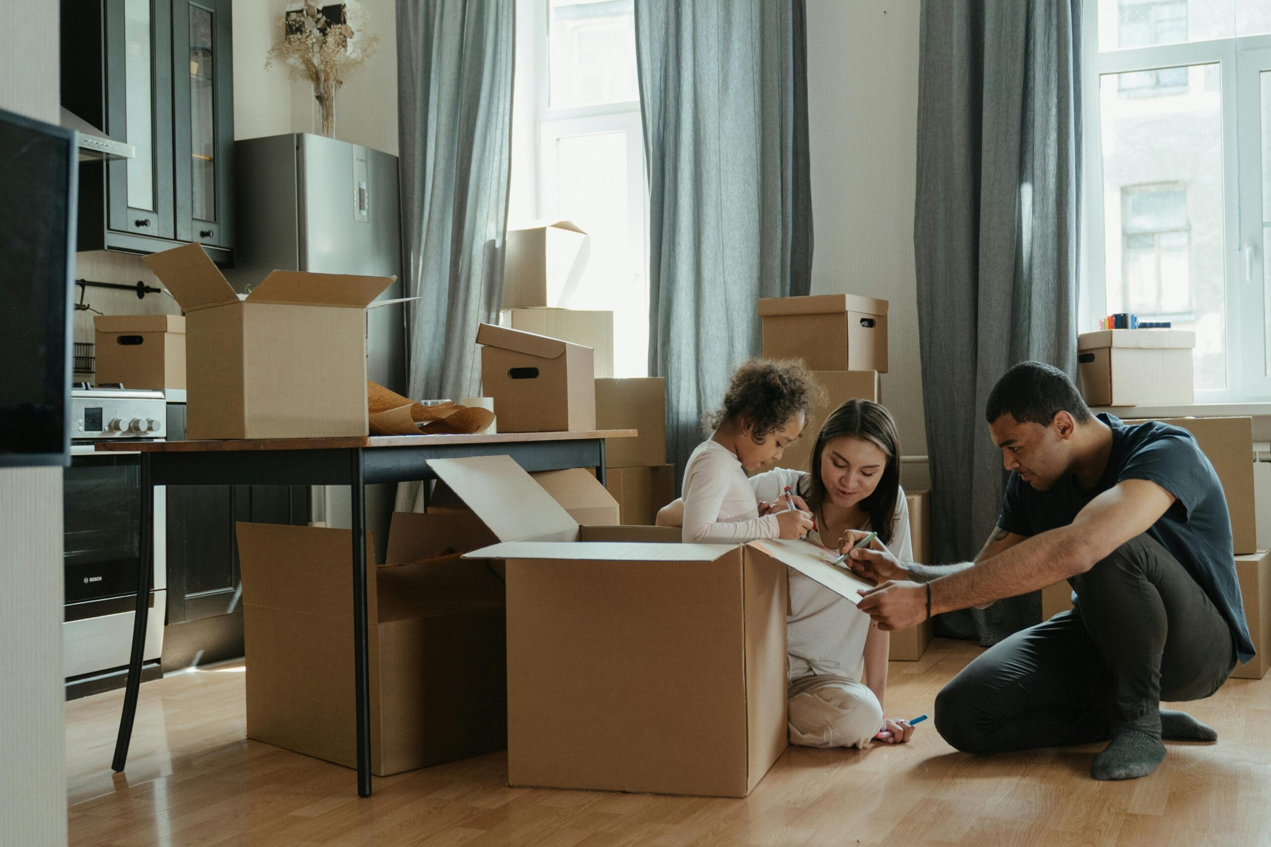 Family Unpacking in the living room 